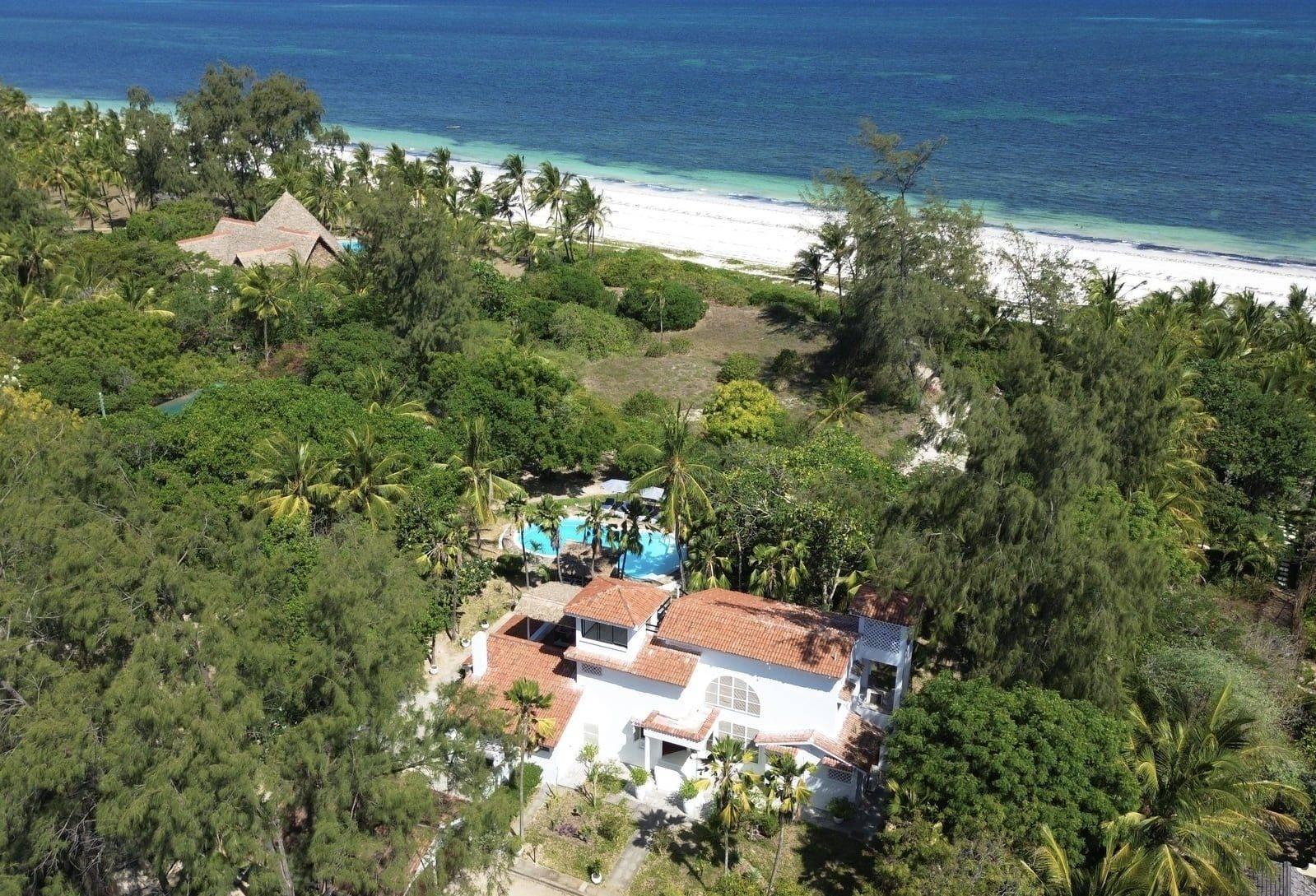 Sandbox villa, its pool and Bofa Beach from the air